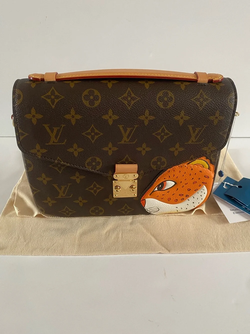 Louis Vuitton pochette Metis (tiger face)